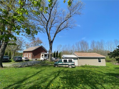 Rear view with garage/shed.