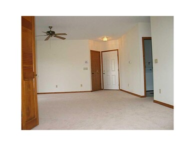 Living Room. View From Dining Area to Entryway.  L