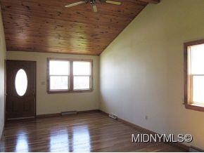 Vaulted knotty pine ceiling