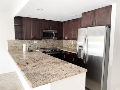 Bayshore Embassy Condominiums unit 310, Fort Lauderdale, FL 33304 - photo 3