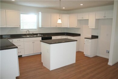 Amazing large working kitchen with loads of cabinets and counter space. New stove, dishwasher, and refrigerator included.