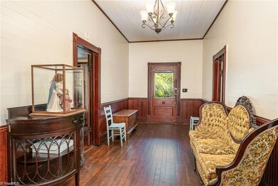 Home foyer. Original front door with original doorbell!