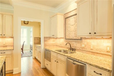 Don’t miss the over sink custom designed focal point or the coveted warming drawer next to the convection oven – superb details wherever you look!