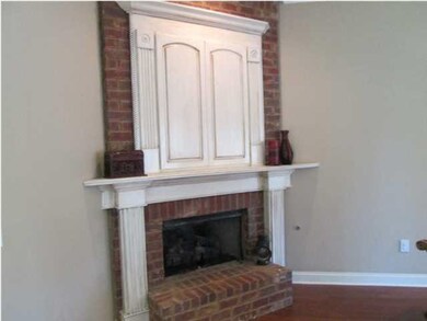Brick surround on gas log fireplace