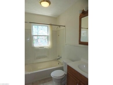 Second floor bath linoleum flooring oak cabinet cu