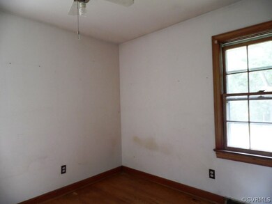 One of 3 Bedrooms, all with hardwood floors.