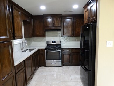 2142 Rainy River Dr, Houston, TX 77088 - photo 4