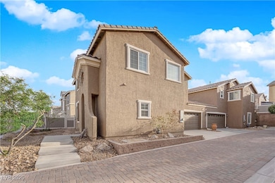 View of side of home with stucco siding, central a