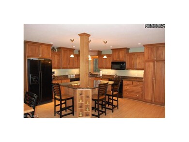 Plenty of custom-made maple cabinetry