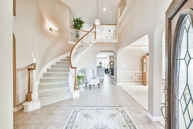 You will love the wow factor with the large two story entryway and sweeping staircase. Perfect for those event photos!
