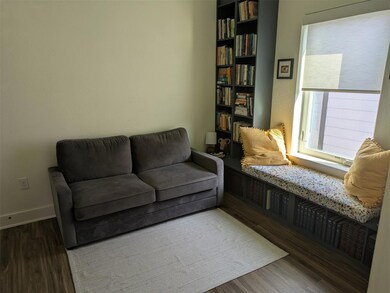 Living area with wood finished floors