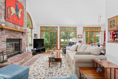 Great Room. Note the Lake in background !