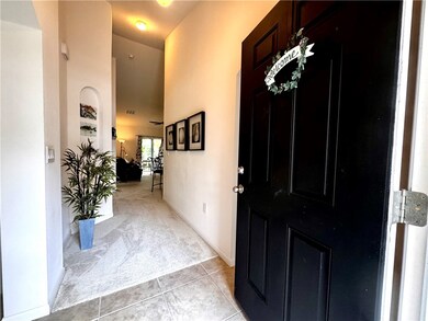 Beautiful Entry with 11 foot vaulted ceilings.