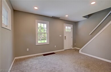 View of carpeted foyer