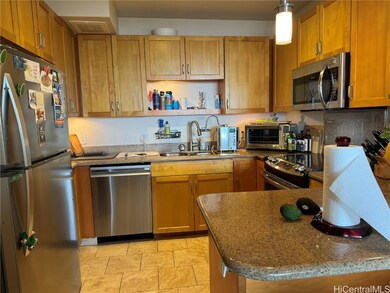 Stainless appliances with counter top that is well