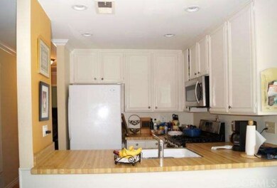 Kitchen, new stainless steel microwave oven.