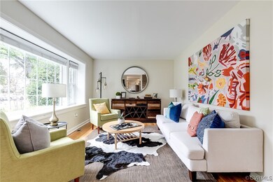 Living room with hardwood / wood-style floors