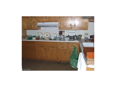 Kitchen with plenty of cupboards and counters.