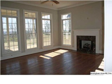 Living room w/ a view & hardwood floors