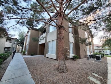 View of side of home featuring stucco siding and c