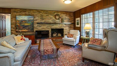Gas Log Fireplace; Brick Wall Feature