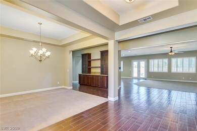 From front entry, Formal Dining room with built-in