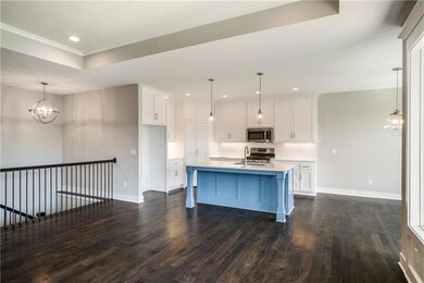 1304 SW Sapperton Rd, Raymore, MO 64083 - photo 5