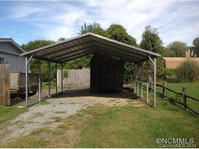 2 Car Carport w/ Storage Bld