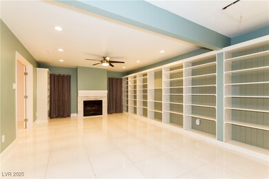 Library/den with adjustable shelving for collectib