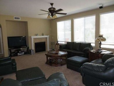 Large family room with ceiling fan
