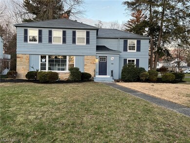 View of front of house with a front lawn