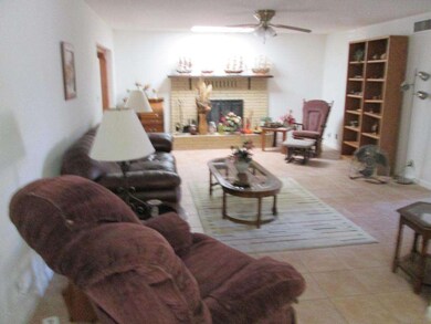 Long Family Room with working Fire Place