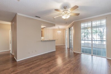 Living room is open to the dining room & kitchen.