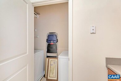 Fully equipped laundry room is off the kitchen.