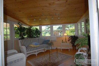 Sunroom: sunny retreat room overlooking the beauti