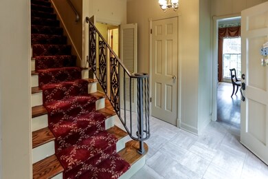 Stairway With Wood Treads & Accented With Wrought 