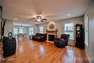  Large living room with gas fireplace and tons of natural light!