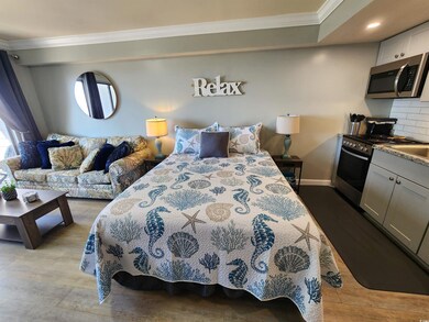 Bedroom featuring ornamental molding, dark wood-type flooring, and recessed lighting