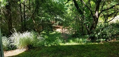 The rear view from the patio is picturesque with nature and is quite private.
