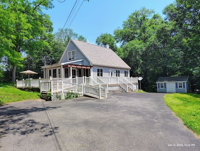 Large driveway with plenty of parking and extra space for turning around
