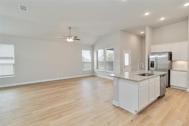 Kitchen with stainless steel appliances, visible 