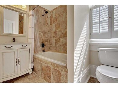 Master Bath/Spa. Solid travertine countertops, pla