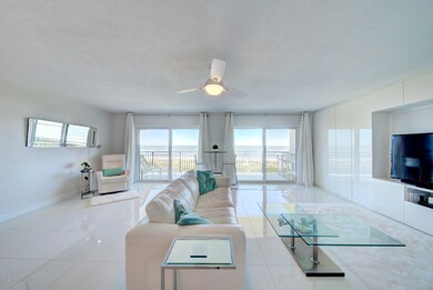 living room with double sliders to balco