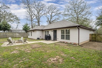 Rear patio view w/firepit
