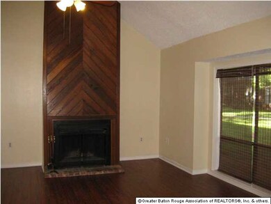 2 story vaulted living room ceiling with fireplace