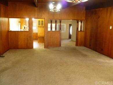 Large family room leads to living room, kitchen, u