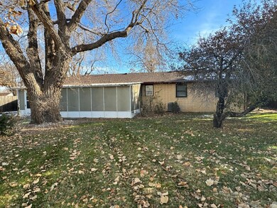 907 S Harrison St, Hugoton, KS 67951 - photo 2