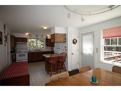Kitchen. The kitchen is open to the...