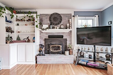 livingroom with wood burning fireplace
