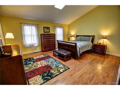 1st floor Master has beautiful, wood floors, skyli